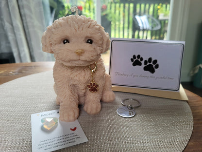 Plush dog toy with a tag and keychain on a table